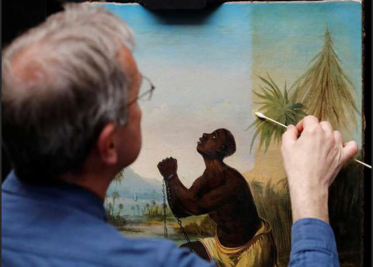British conservationists work to restore acclaimed slavery painting